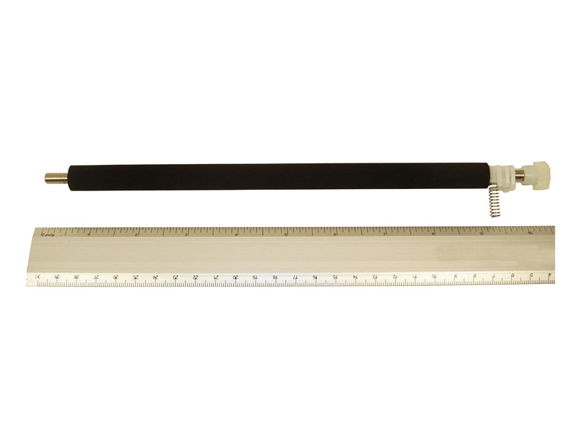 Secondary transfer roller assembly - Long black spongy roller that transfers charge to paper Secondary transfer roller assembly - Long black spongy roller that transfers charge to paper