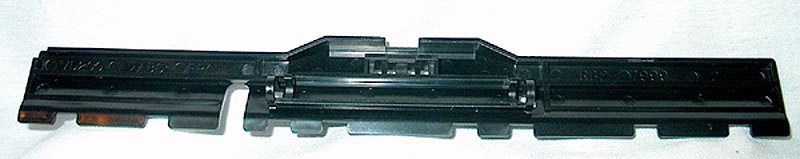 Weight plate (Only) - Black plastic plate that drops down during the paper pickup process and pushes against the paper stack on the pickup rollers - Mounts in the ADF paper pickup assembly Weight plate (Only) - Black plastic plate that drops down during the paper pickup process and pushes against the paper stack on the pickup rollers - Mounts in the ADF paper pickup assembly